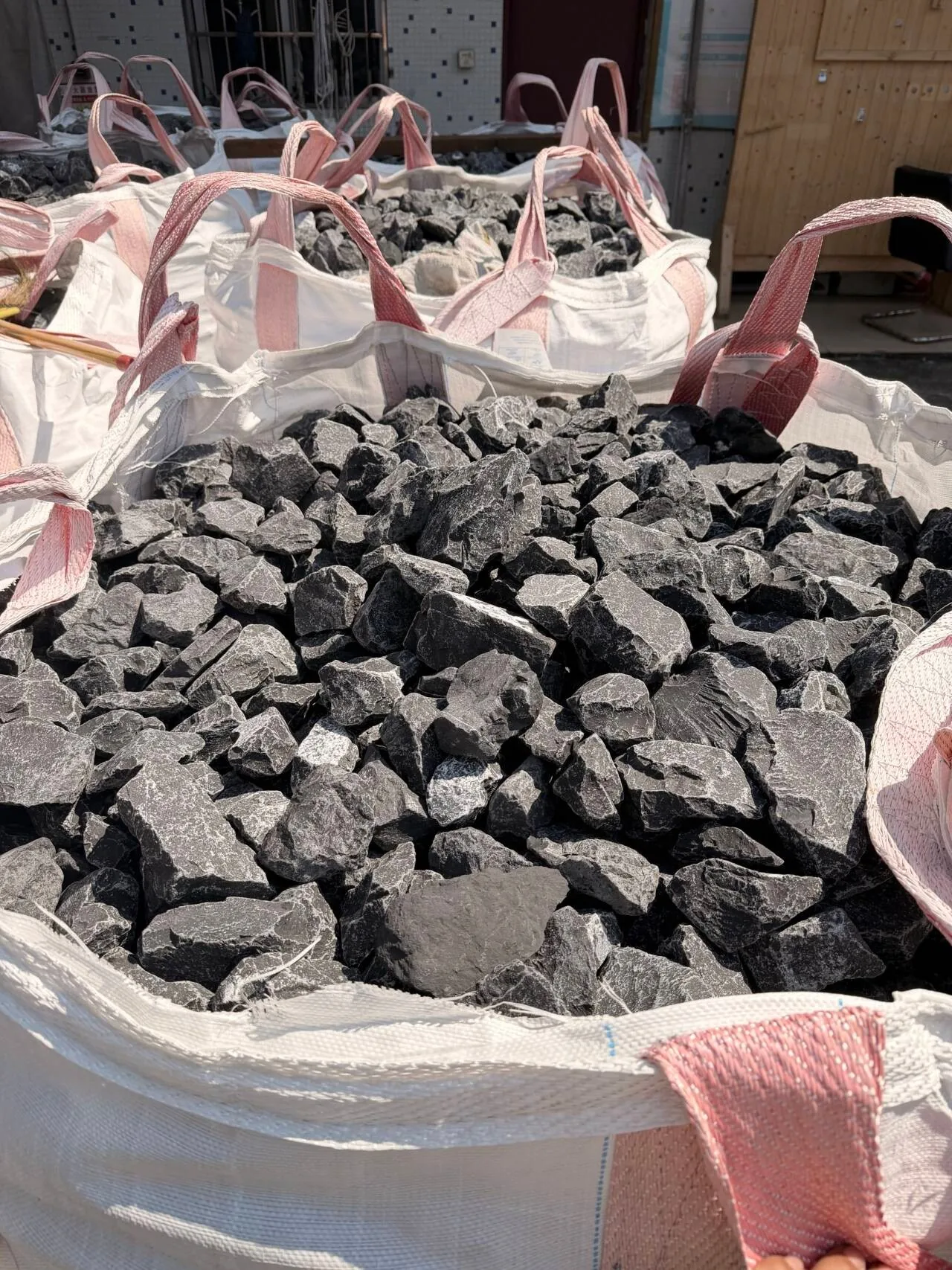 Sacks of sauna stones ready for heater orders