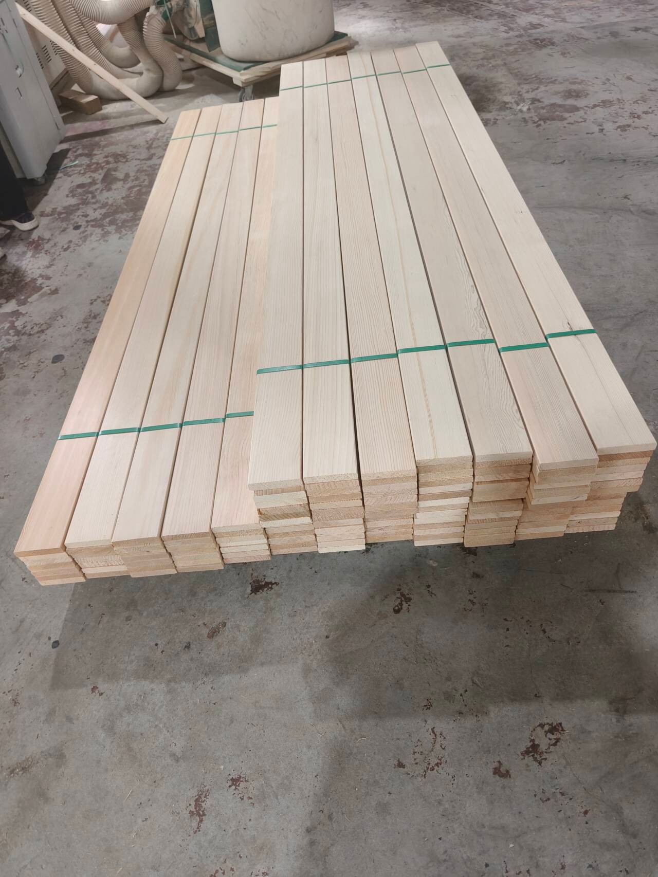 Squared timber graded and stacked by species