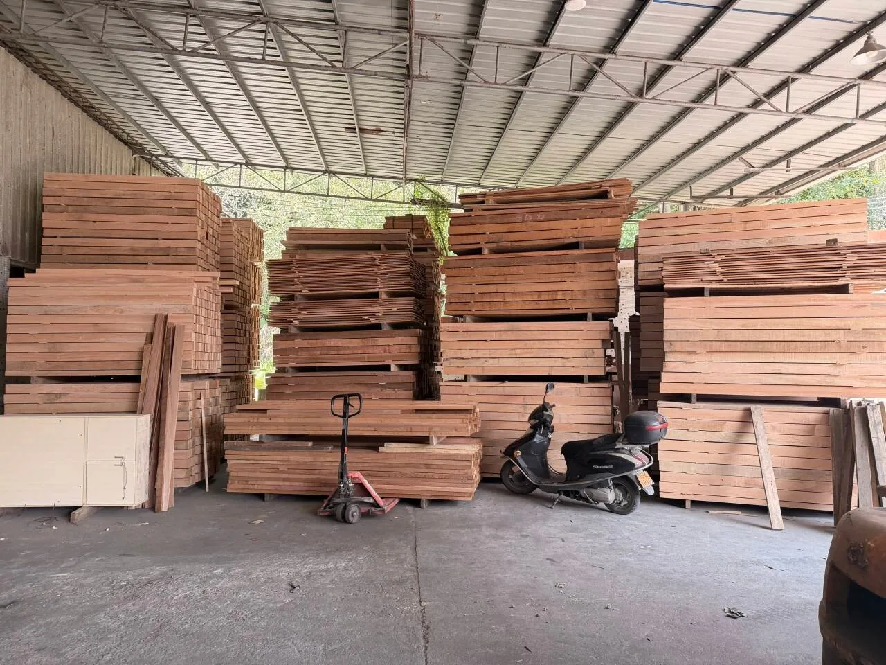 Stacks of sauna timber inside the workshop store